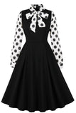 Zwarte Polka Dot Swing jaren 1950 jurk met strikken