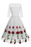 Zwarte A Line Rose Floral jaren 1950 jurk met halve mouwen