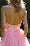 Roze A-lijn strapless ruches tule baljurk