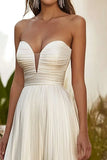 Champagne A Line Strapless Geplooide Lange Bruiloft Gast Jurk