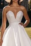 Witte gelaagde strapless A-lijn High Low trouwjurk