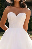 Strapless A-lijn witte knielange trouwjurk met kralen