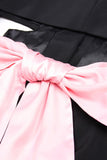 Zwarte inkeping revers uitgesneden vrouwen prom suits met strik