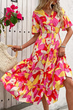 Fuchsia A-lijn zomerjurk met bloemenprint en riem