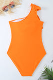 Eendelig oranje strandbadmode met ruches