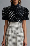 Vintage gegolfde revershals zwart wit Polka dots jurk
