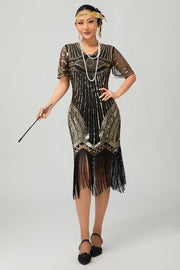 Zwarte gouden pailletten Bodycon jaren 1920 Flapper jurk met kwastjes