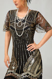 Zwarte gouden pailletten Bodycon jaren 1920 Flapper jurk met kwastjes