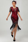 Zwarte gouden pailletten Bodycon jaren 1920 Flapper jurk met kwastjes