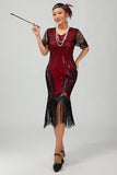 Zwarte gouden pailletten Bodycon jaren 1920 Flapper jurk met kwastjes