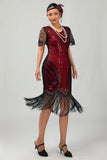 Zwarte gouden pailletten Bodycon jaren 1920 Flapper jurk met kwastjes