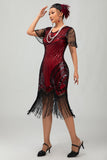 Zwarte gouden pailletten Bodycon jaren 1920 Flapper jurk met kwastjes
