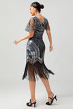 Zwarte gouden pailletten Bodycon jaren 1920 Flapper jurk met kwastjes