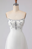Witte A-lijn strapless satijnen trouwjurk met kralen