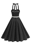 Polka dots halter zwart A Line jurk uit de jaren 50 met strik