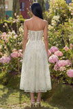 Lichtgroene geappliqueerde korset strapless tule A-lijn midijurk