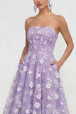 Strapless A-lijn midi lila bloemenjurk met zakken