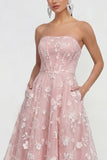 Strapless A-lijn midi lila bloemenjurk met zakken
