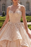 Strapless champagne-appliqueerde baljurk met ruches in quinceañera jurk