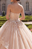 Strapless champagne-appliqueerde baljurk met ruches in quinceañera jurk