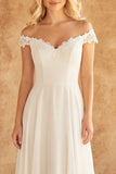 Off-the-shoulder ivoorkant A-lijn chiffon trouwjurk