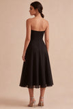 Strapless A-lijn midi black tie jurk
