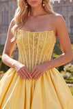 Gele A-lijn strapless doorschijnende korset met veter achterin homecoming jurk met parels