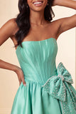A-lijn mintgroen satijn strapless veter op de achterkant parel korset homecoming jurk met strik