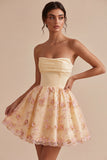 Lichtgele A-lijn strapless bloemen geborduurde homecomingjurk
