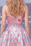 Glinsterende roze A-lijn strapless pailletten homecomingjurk met strik