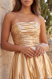 Strapless metallic goud gerimpelde A-lijn korte homecomingjurk met ruches