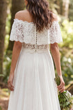 Off-the-shoulder ivoorkleurige A-lijn lange tule trouwjurk