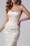 Ivoorkleurige strapless zeemeermin korset, pailletten, lange jurk met kant op de rug