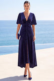 Polka dots marineblauwe V-hals midi-jurk met hoge zoom en fladderende korte mouwen