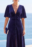 Polka dots marineblauwe V-hals midi-jurk met hoge zoom en fladderende korte mouwen