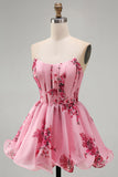 Roze A-lijn strapless korset met ruches en bloemenprint korte homecomingjurk