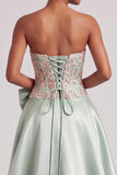 Groene korset A-lijn strapless satijn appliques galajurk met strik en split