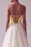 Gele satijnen A-lijn strapless Jacquard lange galajurk