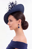 Donkergroene Sinamay stoffen bloem fascinatorhoed met veer