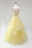 Gele baljurk korset strapless parels met lagen en lange baljurk met ruches