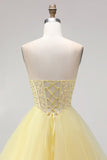 Gele baljurk korset strapless parels met lagen en lange baljurk met ruches