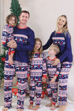 Rode kerstpyjama met winterprint voor het gezin