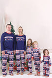 Rode kerstpyjama met winterprint voor het gezin