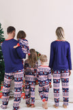 Rode kerstpyjama met winterprint voor het gezin
