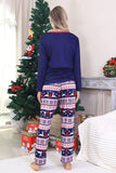 Rode kerstpyjama met winterprint voor het gezin