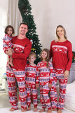 Rode kerstpyjama met winterprint voor het gezin