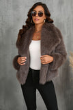 Pluizige zwarte revers faux fur winterjas