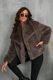 Pluizige zwarte revers faux fur winterjas