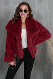 Pluizige zwarte revers faux fur winterjas