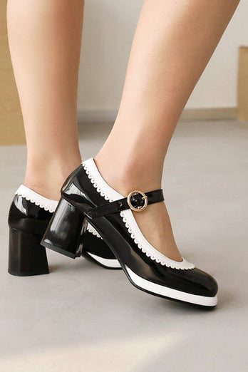 Zwarte schoenen met ronde teen en verstelbare riem